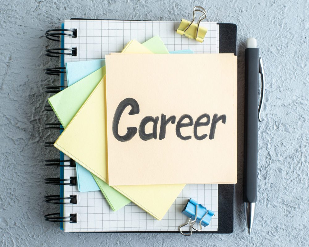 top-view-career-written-note-with-stickers-notepad-white-surface-job-office-school-copybook-salary-college-business-color